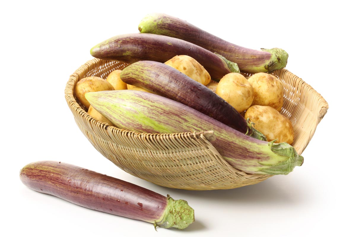 eggplant and potatoes in basket