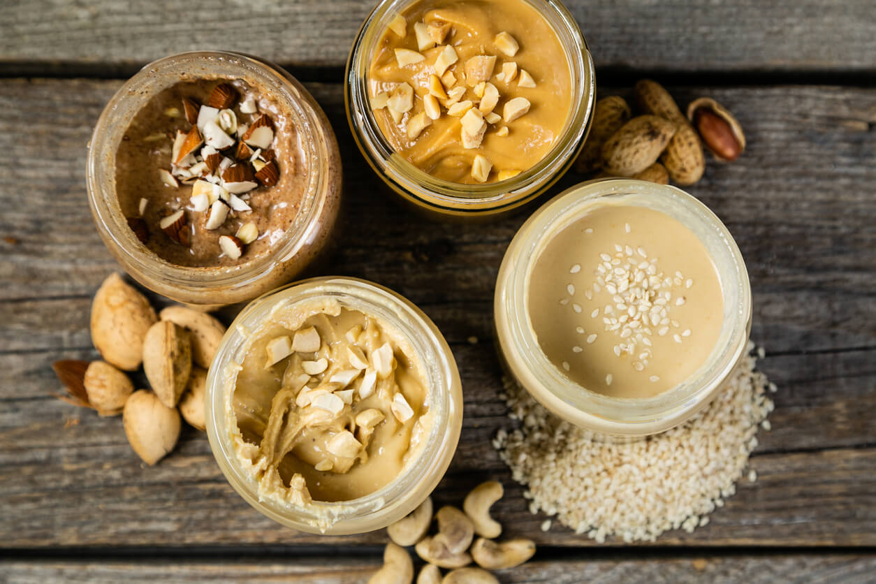selection of nut butter including peanut cashew almond and sesame seeds
