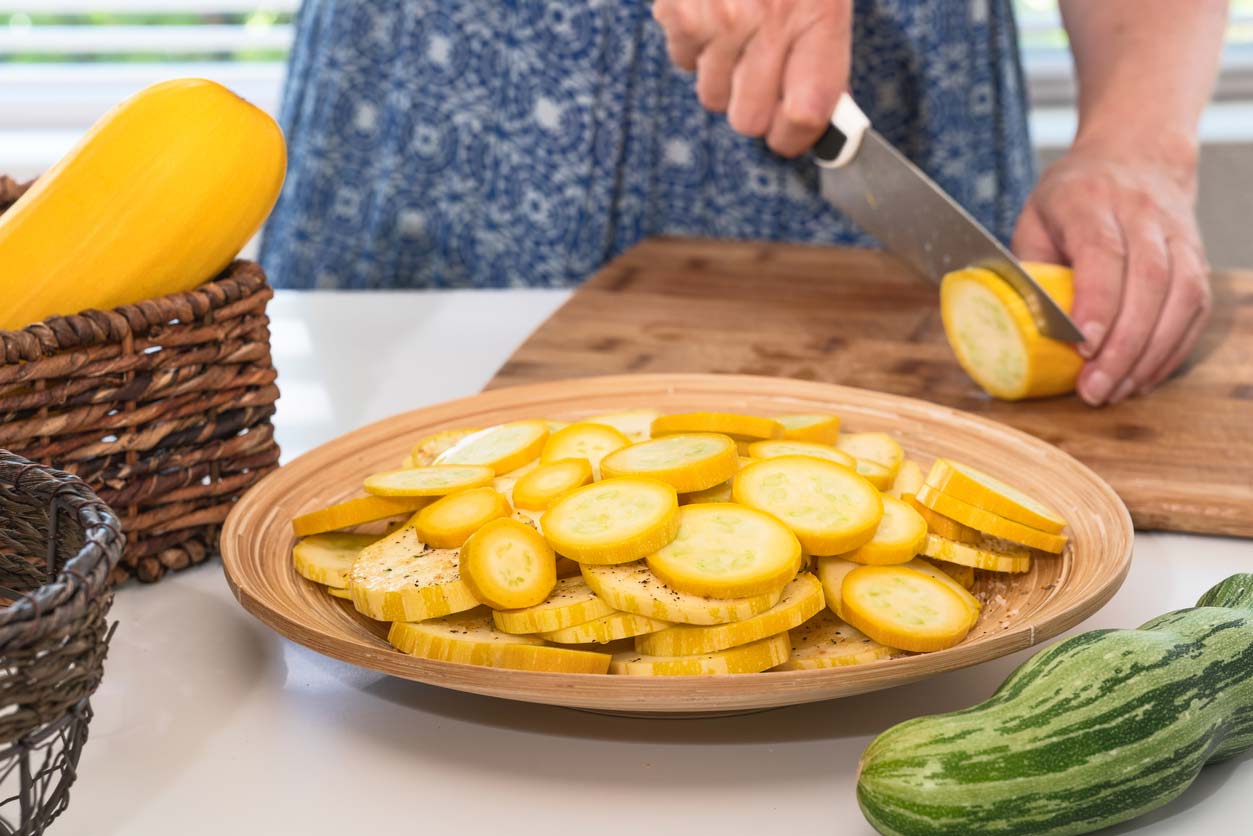Slicing yellow squash for healthy recipe