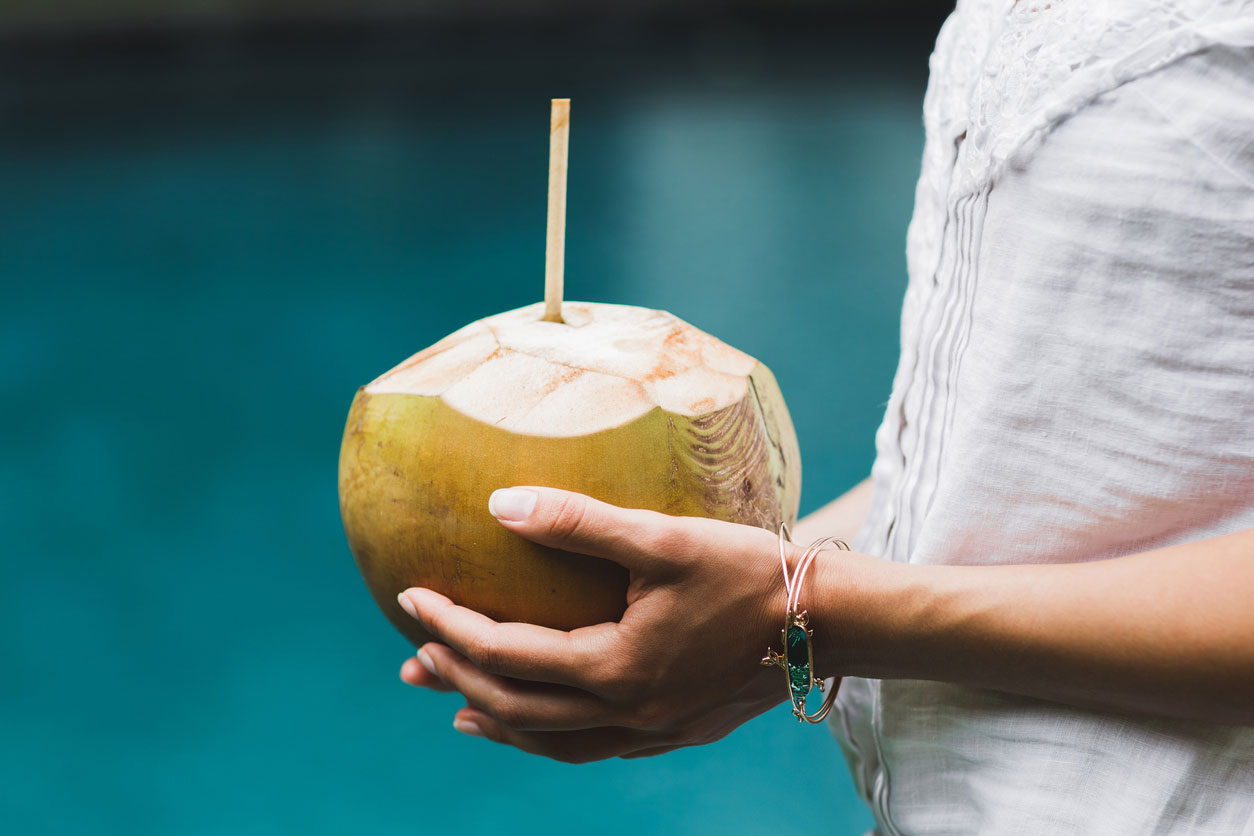 Drinking coconut water for its health benefits